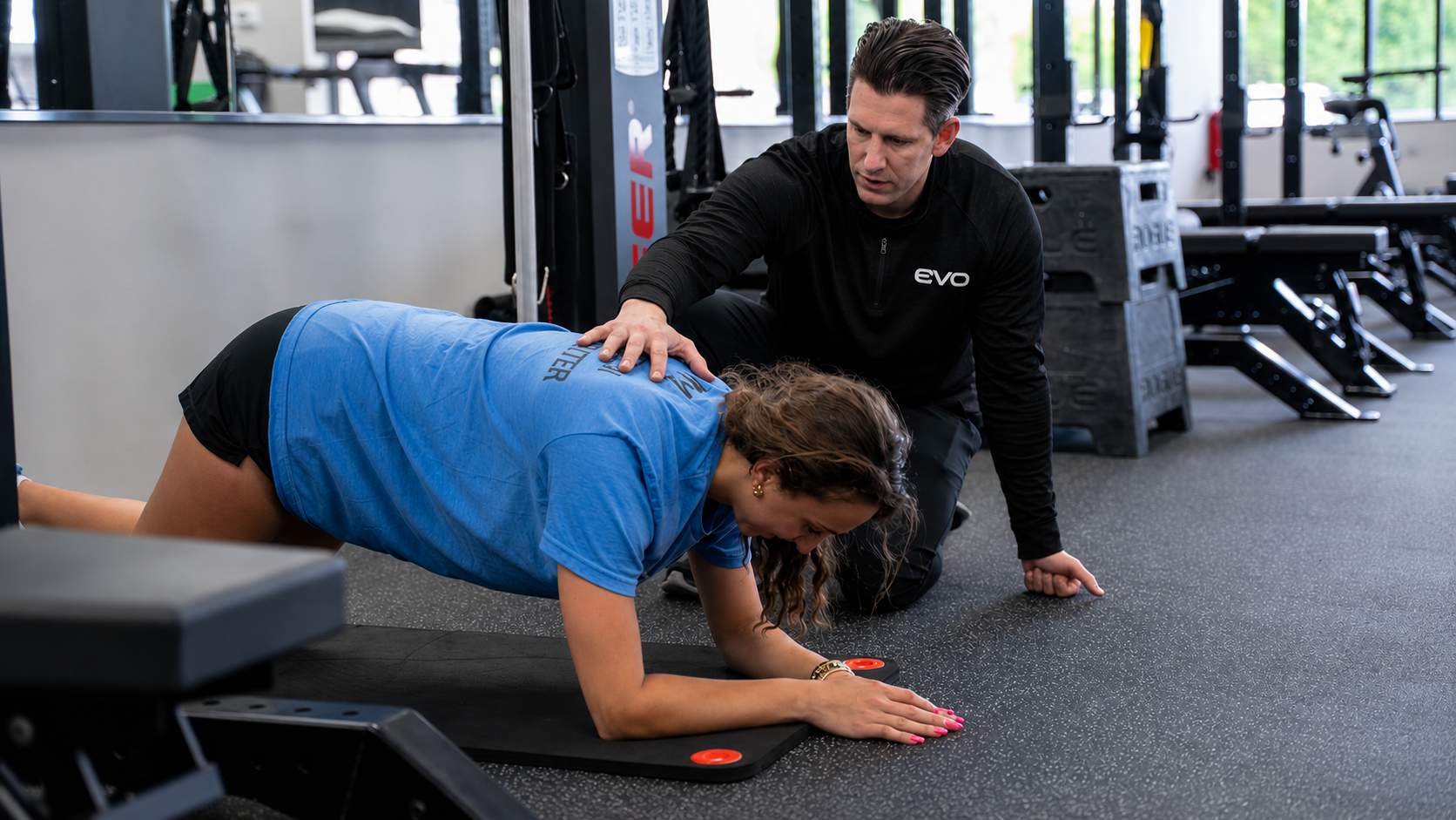 EVO physical therapist coaching a patient